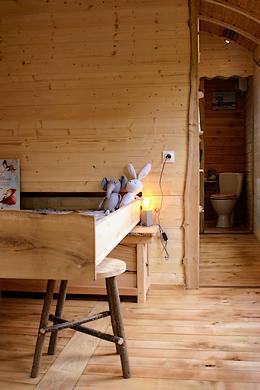 Lit supplémentaire amovible dans le séjour.